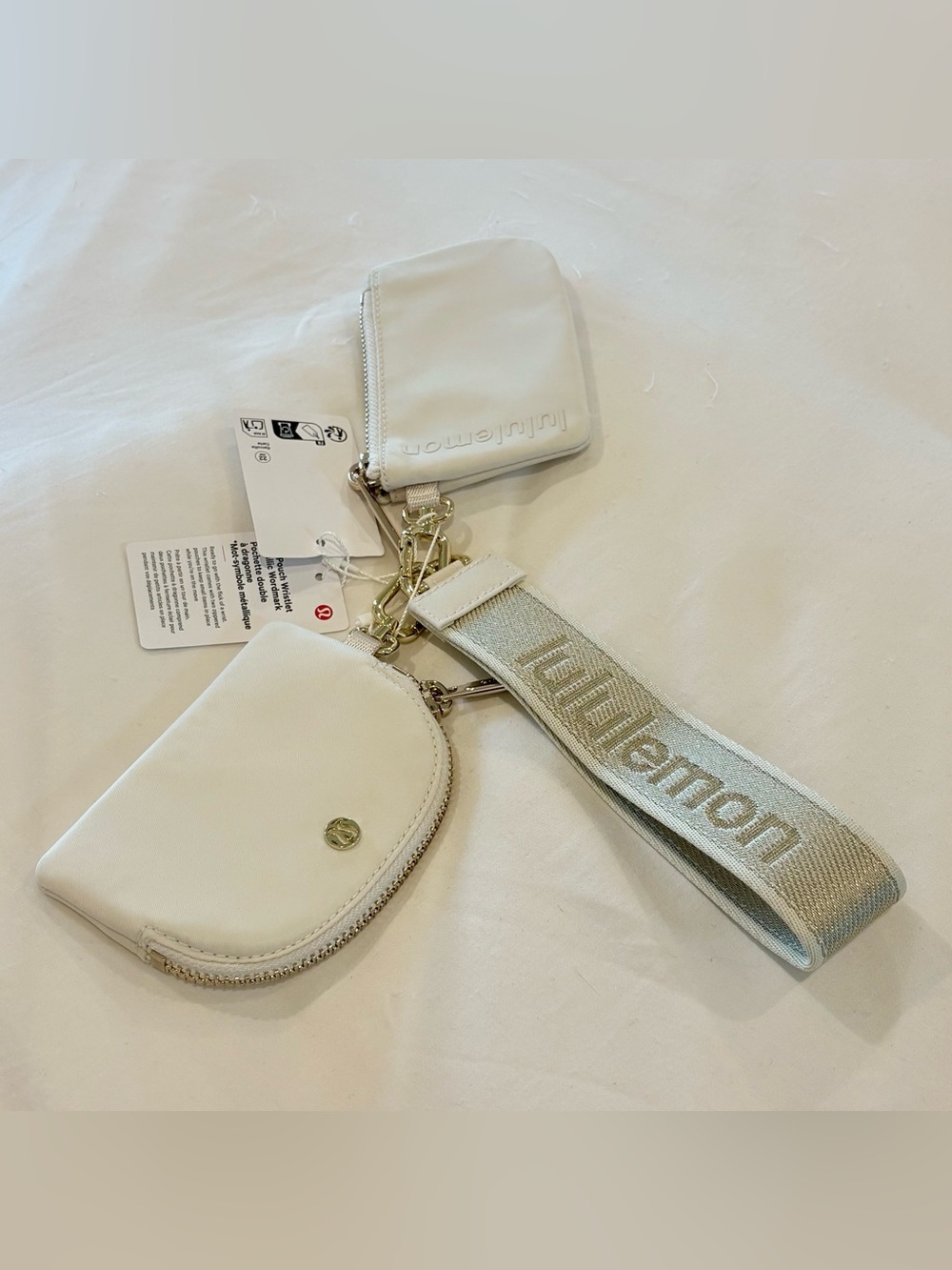 NWT Lululemon Dual Pouch Wristlet Metallic Wordmark Light Ivory Gold Cream